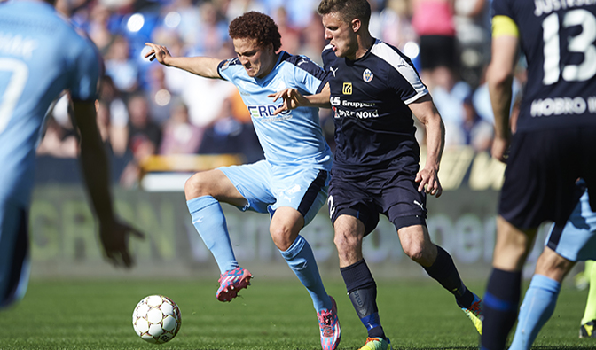 RANDERS, DENMARK - MAY 07: (L to R) Mustafa Amini of Randers FC and Anders Egholm of Hobro IK compete for the ball during the Danish Alka Superliga match between Randers FC and Hobro IK at BioNutria Park Randers on May 07, 2016 in Randers, Denmark. (Photo by Jan Christensen / FrontzoneSport via Getty Images)