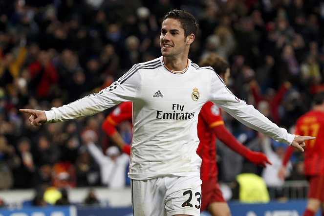 Real Madrid's Francisco "Isco" Alarcon celebrates after scoring a goal against Galatasaray during their Champions League soccer match at Santiago Bernabeu stadium in Madrid November 27, 2013.   REUTERS/Juan Medina (SPAIN  - Tags: SPORT SOCCER)