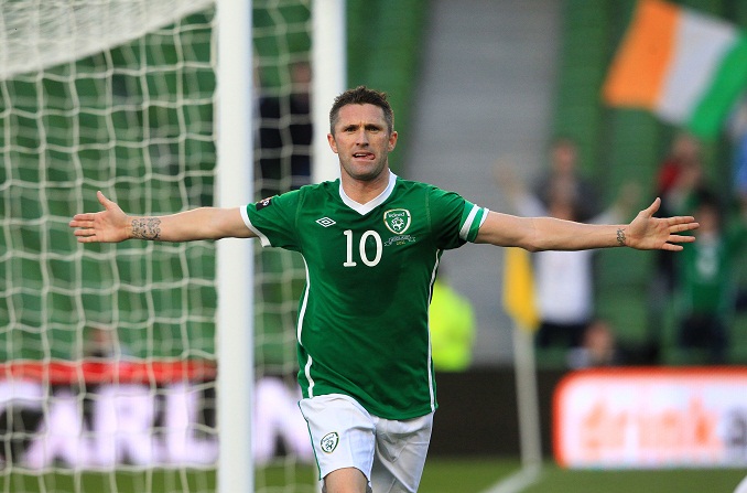 Republic of Ireland's Robbie Keane celebrates his goal against Northern Ireland with teammates during an international friendly football match at the Aviva Stadium in Dublin on May 24, 2011. AFP PHOTO/ PETER MUHLY (Photo credit should read PETER MUHLY/AFP/Getty Images)