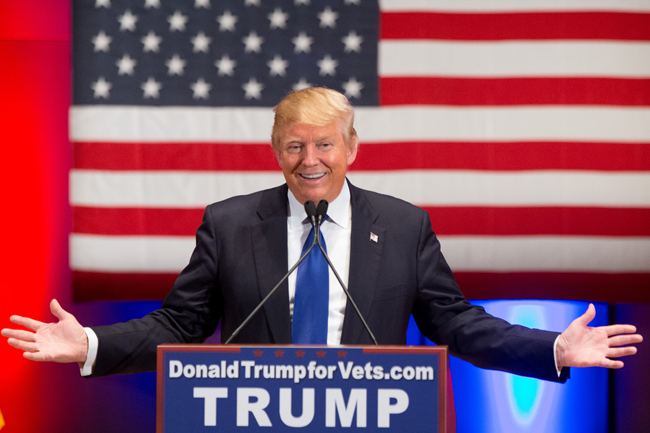 Republican presidential candidate Donald Trump smiles while speaking at a rally at Drake University in Des Moines, Iowa, Thursday, Jan. 28, 2016. (AP Photo/Andrew Harnik)