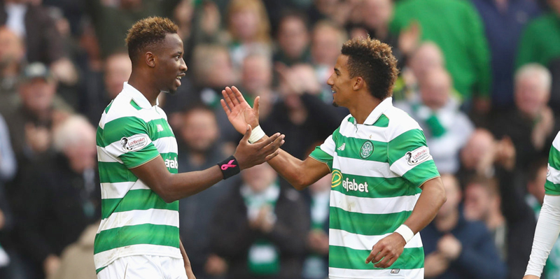 GLASGOW, SCOTLAND - OCTOBER 23: Moussa Dembele of Celtic (L) celebrates scoring his sides first goal with team mates Scott Sinclair (C) and Leigh Griffiths (R) during the Betfred Cup Semi Final match between Rangers and Celtic at Hampden Park on October 23, 2016 in Glasgow, Scotland. (Photo by Michael Steele/Getty Images)