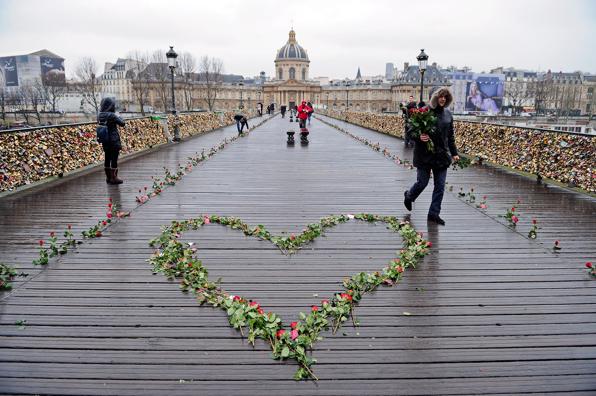 PARIS, FRANCE - FEBRUARY 14: The Pont Des Arts is covered in roses to celebrate Valentine's Day on February 14, 2014 in Paris, France. (Photo by Kristy Sparow/Getty Images)