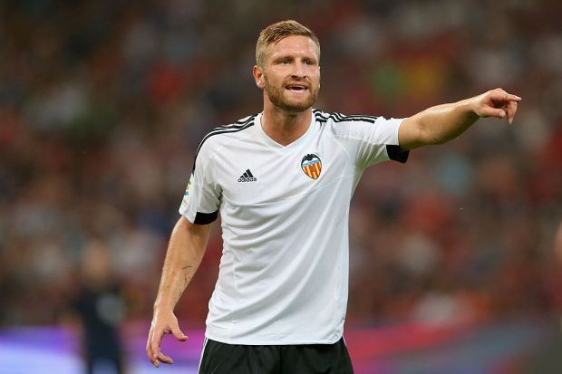 of Muenchen battles for the ball with of Valencia during the international friendly match between FC Bayern Muenchen and Valencia FC at the Audi Football Summit during at National Stadium on July 18, 2015 in Beijing, China.